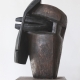 Kopf mit Maske . Bronzeskulptur . Beate Debus . 2012